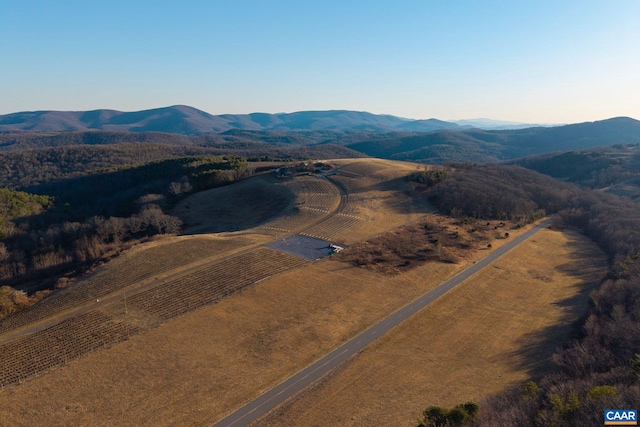 bird's eye view with a mountain view and a rural view