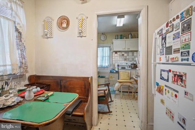 dining space with light floors