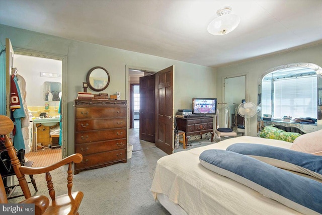 bedroom with light carpet