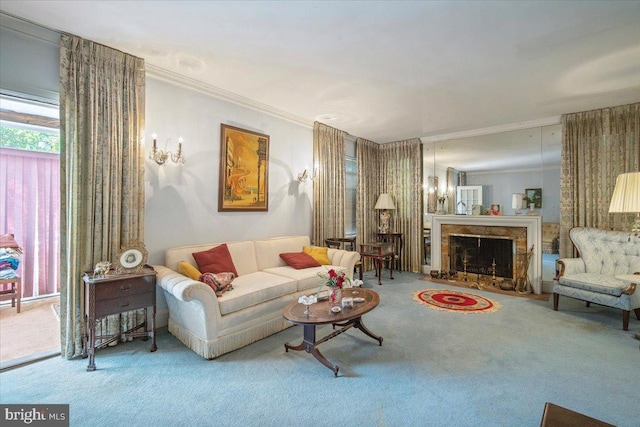 carpeted living area with a premium fireplace and ornamental molding