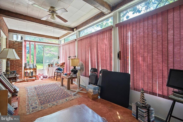 interior space featuring beamed ceiling and carpet floors