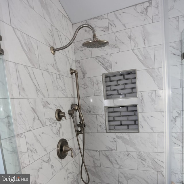 room details with a tile shower