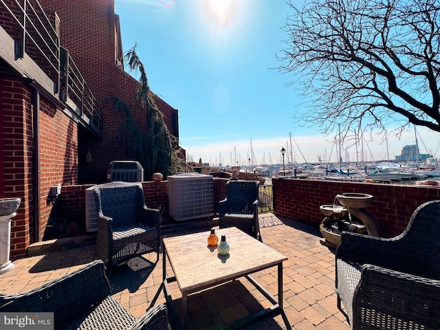 view of patio with central air condition unit