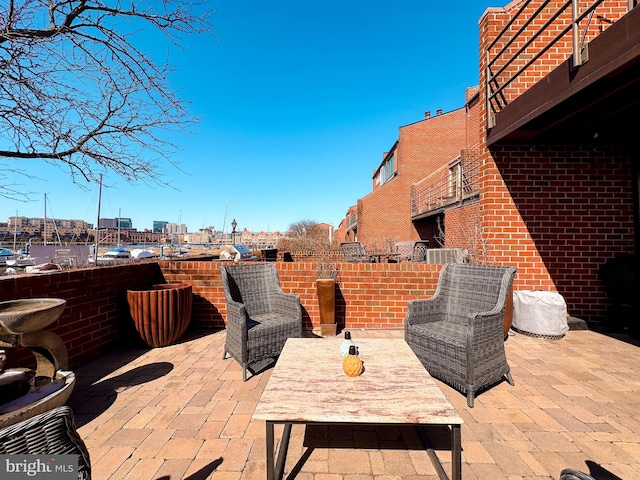 view of patio / terrace featuring a view of city