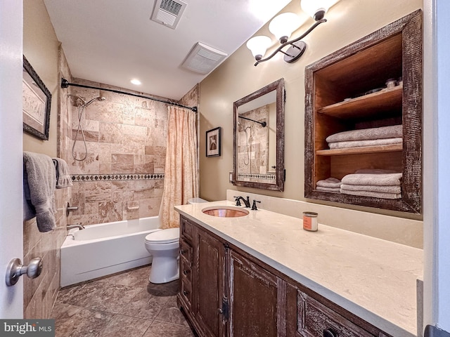 bathroom featuring vanity, shower / tub combo, toilet, and visible vents