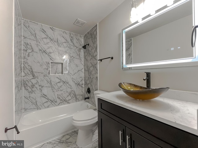 bathroom featuring visible vents, toilet, shower / bath combination, marble finish floor, and vanity