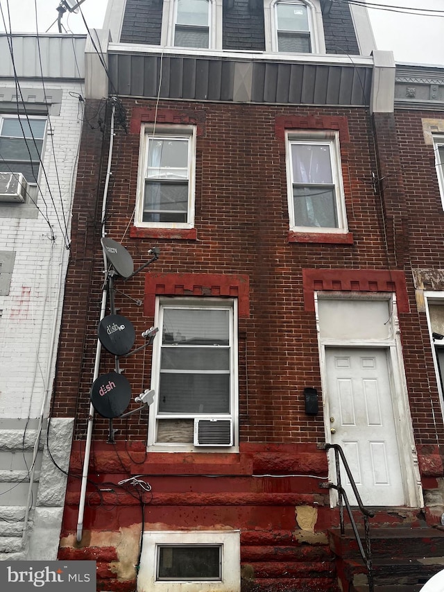 view of home's exterior featuring brick siding