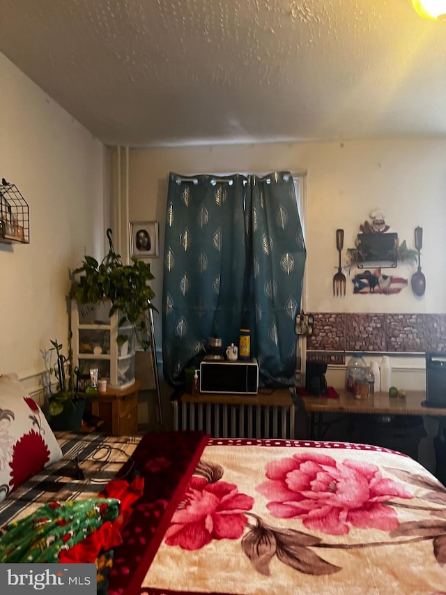 bedroom with a textured ceiling