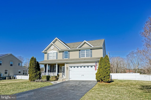 view of front facade featuring fence, an attached garage, covered porch, a front lawn, and aphalt driveway