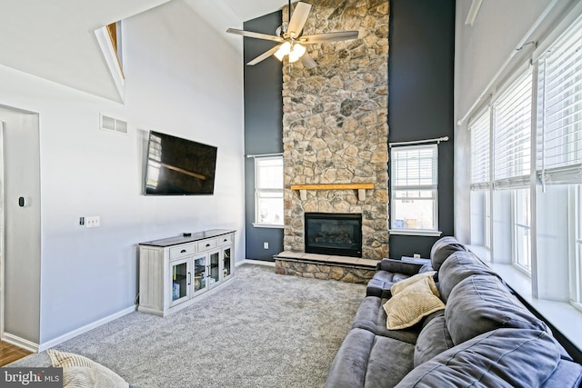 living room with visible vents, high vaulted ceiling, a healthy amount of sunlight, and ceiling fan