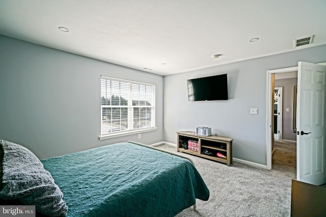 bedroom featuring recessed lighting, carpet flooring, baseboards, and visible vents