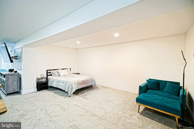 carpeted bedroom featuring recessed lighting and baseboards