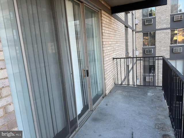 balcony featuring a wall mounted air conditioner