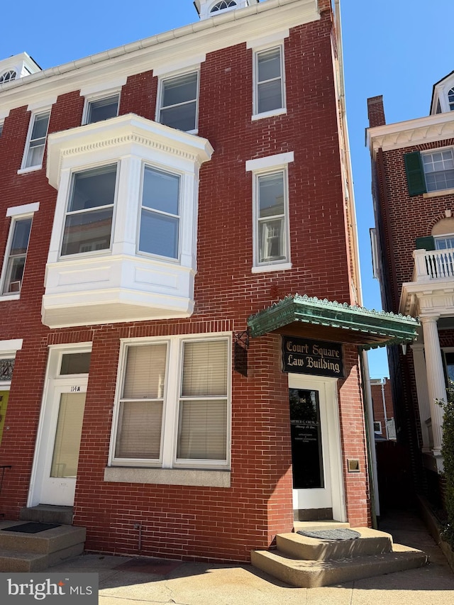 multi unit property featuring brick siding