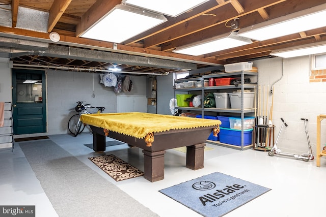 recreation room with concrete floors and billiards