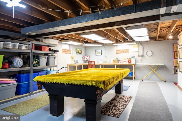 game room featuring concrete floors