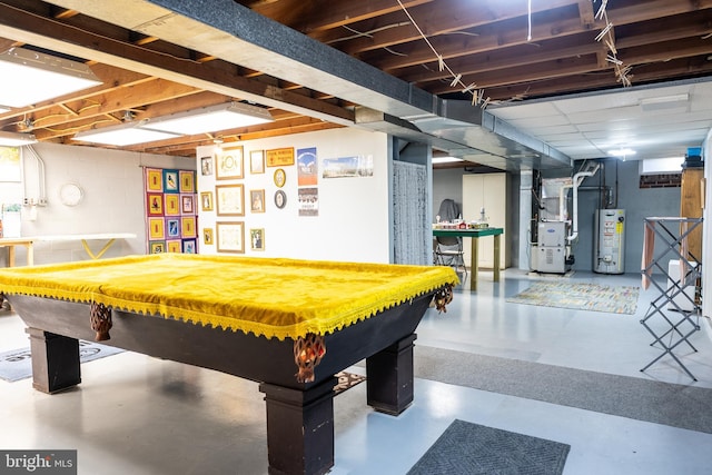 game room featuring pool table, gas water heater, heating unit, and concrete floors