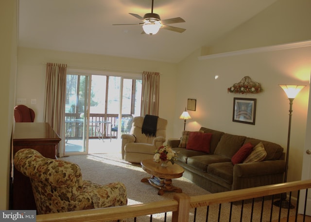 carpeted living area featuring vaulted ceiling and ceiling fan