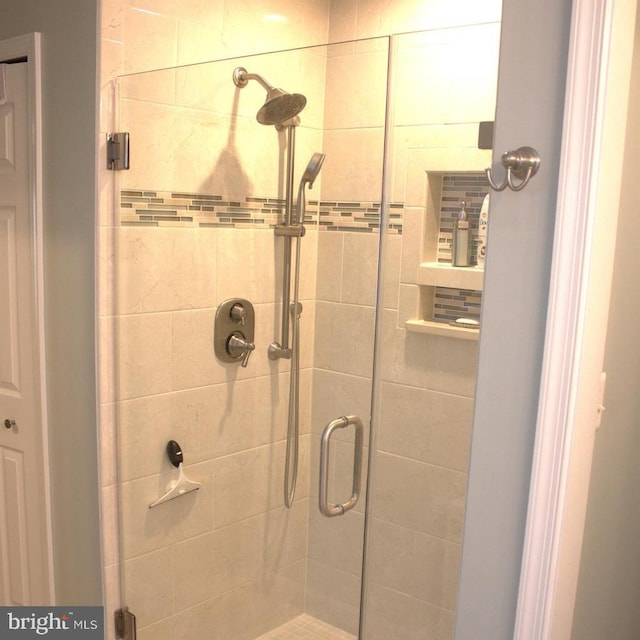 bathroom featuring a stall shower