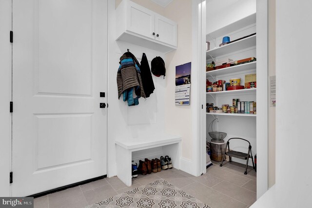 mudroom featuring light tile patterned floors
