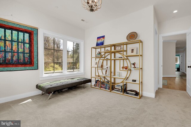 interior space with carpet floors, baseboards, and visible vents