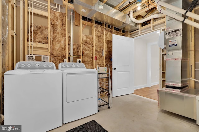 laundry room featuring independent washer and dryer and laundry area