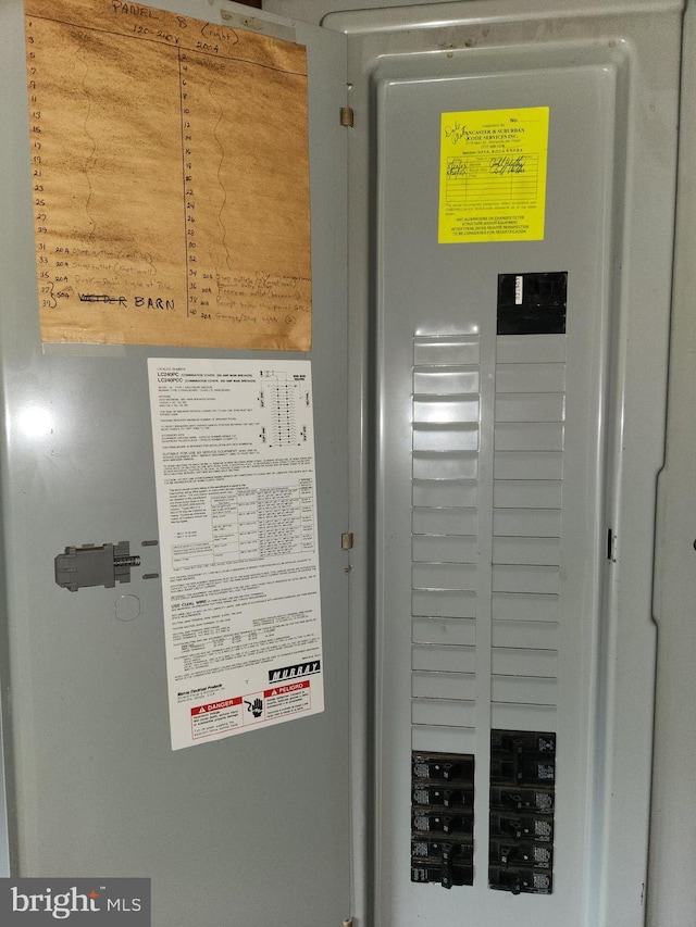 utility room featuring electric panel