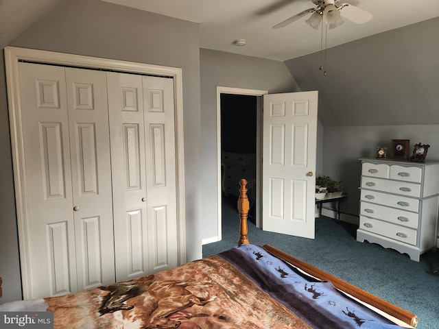 carpeted bedroom with a closet, lofted ceiling, and a ceiling fan