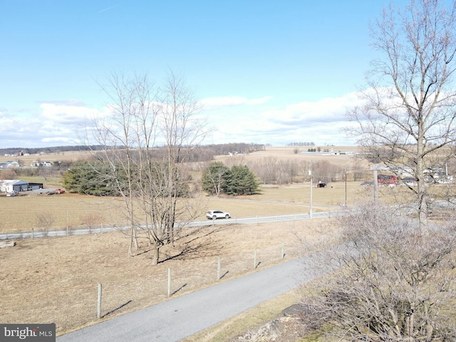 exterior space with a rural view