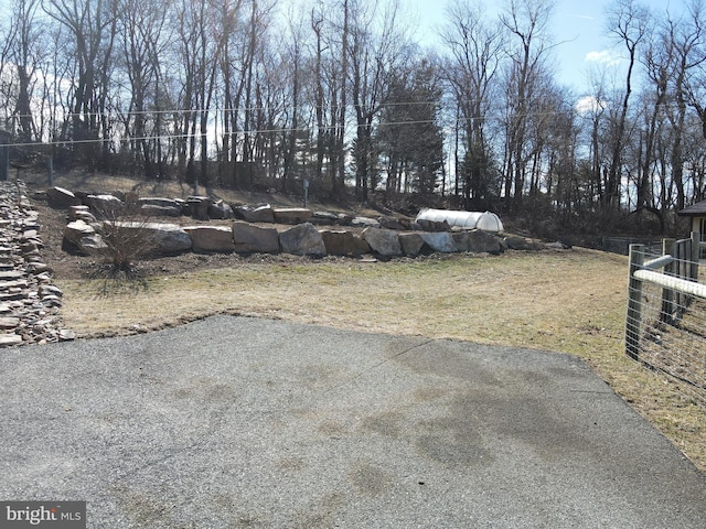 view of yard featuring fence