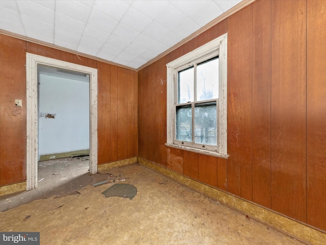 empty room with wood walls