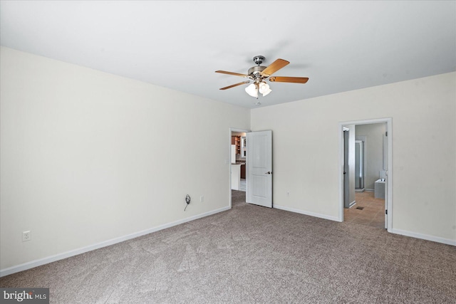 unfurnished bedroom with baseboards and carpet floors