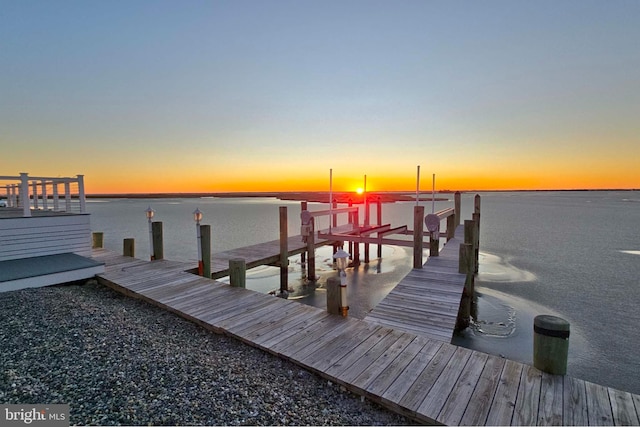 view of dock featuring a water view and boat lift