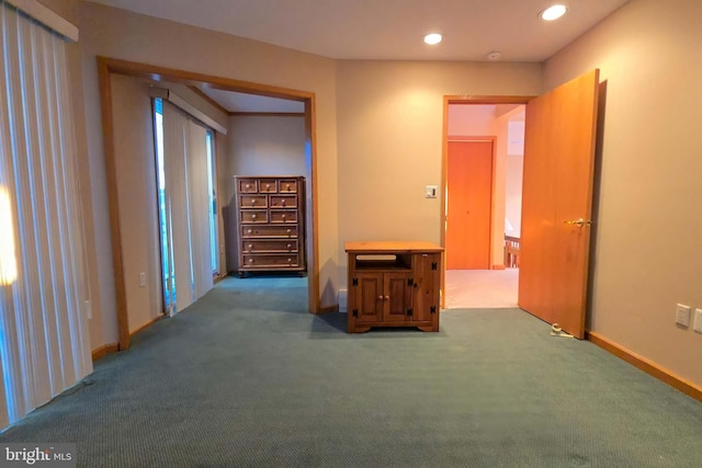 hallway featuring recessed lighting, baseboards, and carpet