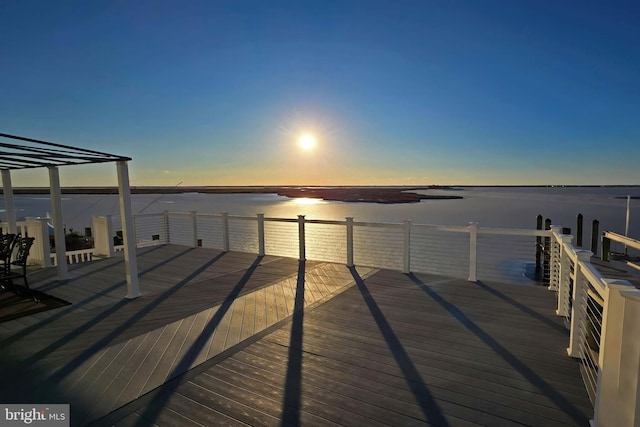 dock area with a deck with water view