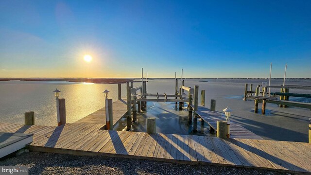 dock area featuring a water view and boat lift