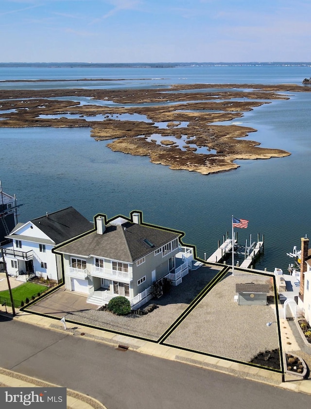 bird's eye view with a water view