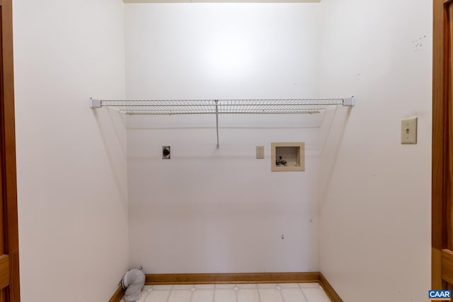 laundry room with washer hookup, laundry area, baseboards, and electric dryer hookup