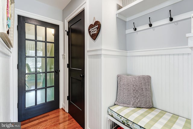 mudroom with wood finished floors