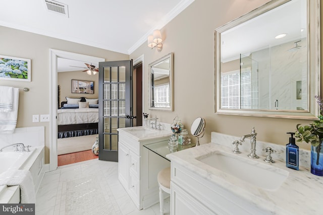 bathroom with visible vents, crown molding, a stall shower, ensuite bathroom, and a sink