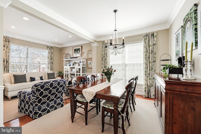 dining room featuring recessed lighting, plenty of natural light, light wood-style floors, and crown molding