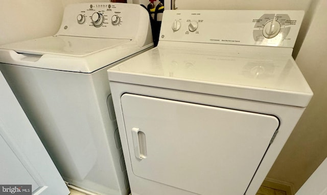 laundry area featuring laundry area and independent washer and dryer