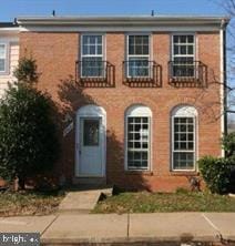 view of front facade with brick siding