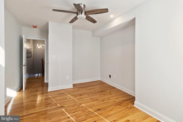 interior space featuring recessed lighting, visible vents, baseboards, and light wood-style floors