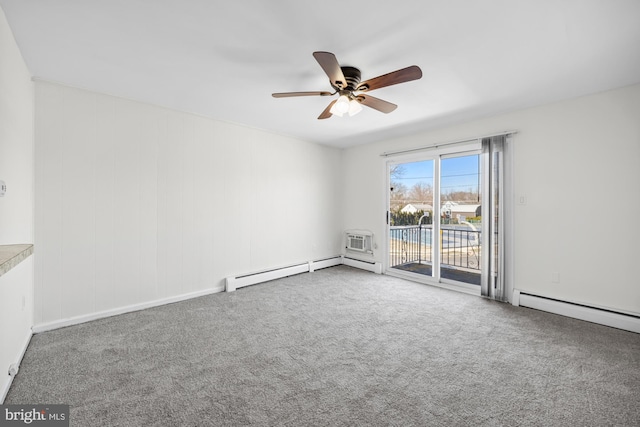 carpeted empty room with a baseboard heating unit, an AC wall unit, and ceiling fan