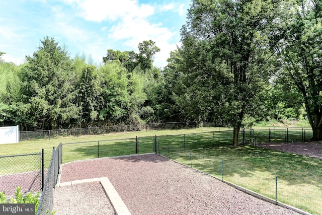 view of yard featuring a gate and fence