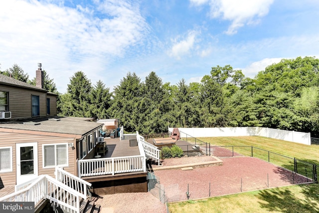 view of yard featuring a deck and fence