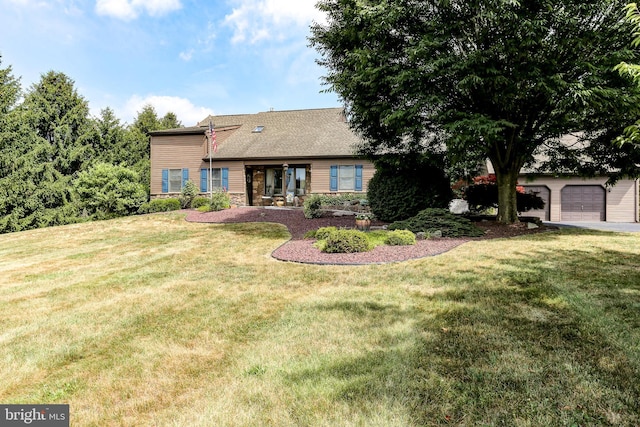 view of front of home with stone siding and a front lawn