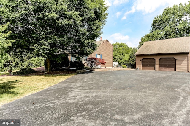 view of home's exterior with a garage