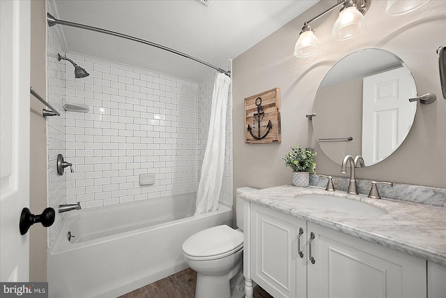 2901 Atlantic Ave Unit 101The, Towers, Ocean City, MD 21842 - full bathroom featuring shower / bath combo with shower curtain, vanity, toilet, and wood finished floors